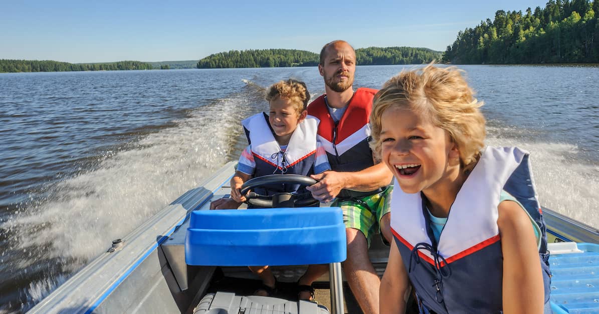 a family rides a motor boat | Oliver Law Firm