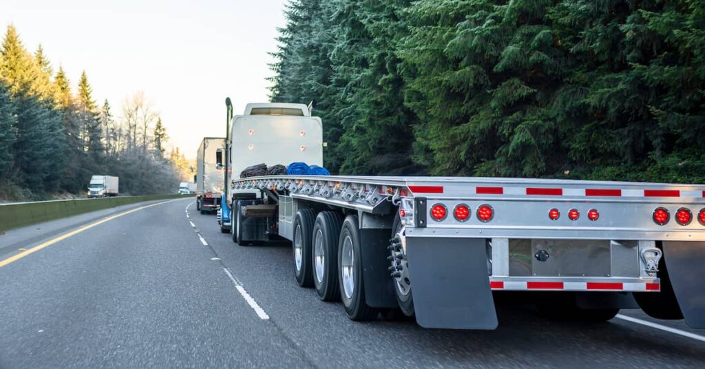 semi truck travels along highway - Oliver Law Firm Arkansas truck accident lawyers