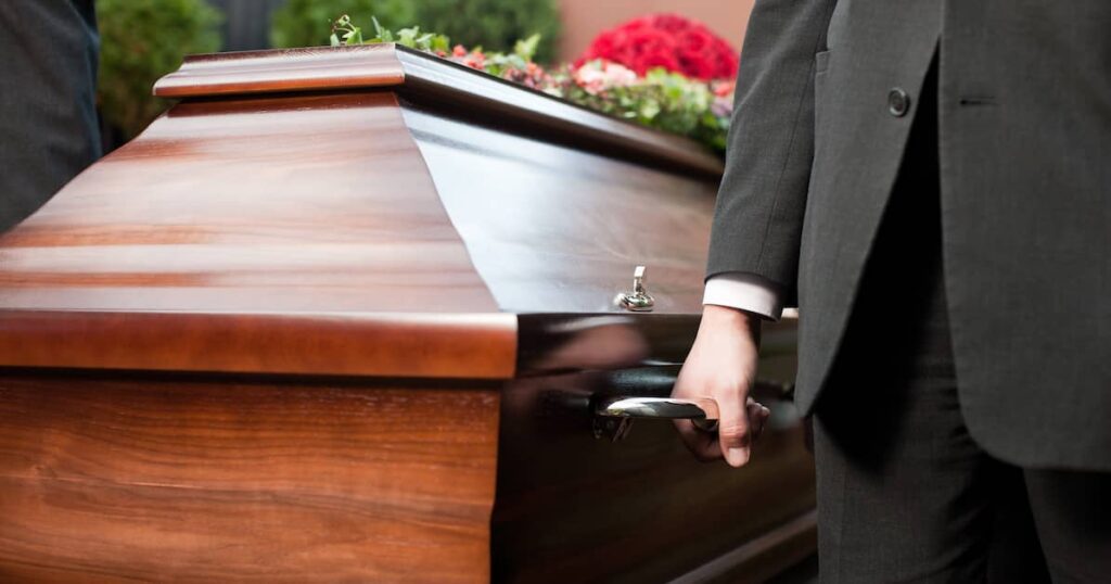 Pallbearers and casket at funeral | Oliver Law Firm wrongful death lawyers