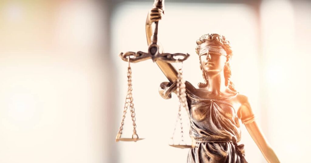 statuette of lady justice - Oliver Law Firm personal injury lawyers